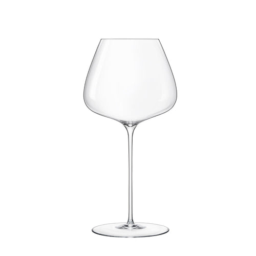 Calice en verre transparent avec large coupe en forme de tulipe, pied fin et base ronde plate, sur fond blanc.