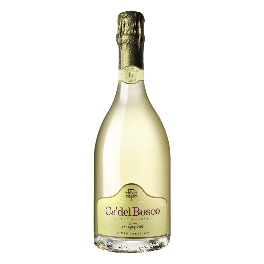 Ca'del Bosco Franciacorta cuvée prestige 47th edition transparent glass bottle with beige label and black and gold lettering