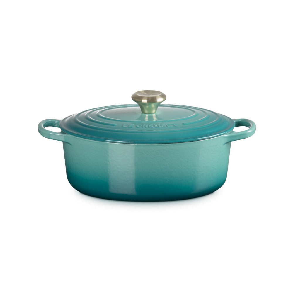 Casserole ovalizzata en fonte, couleur turquoise avec finition brillante, poignée métallique cerchiato en cima.