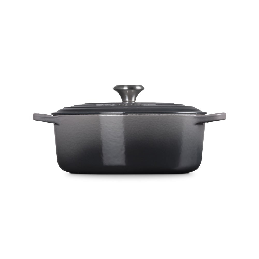 Casserole carrée grise avec couvercle, anses ai lati, surface brillante et finition en materiale ceramico.