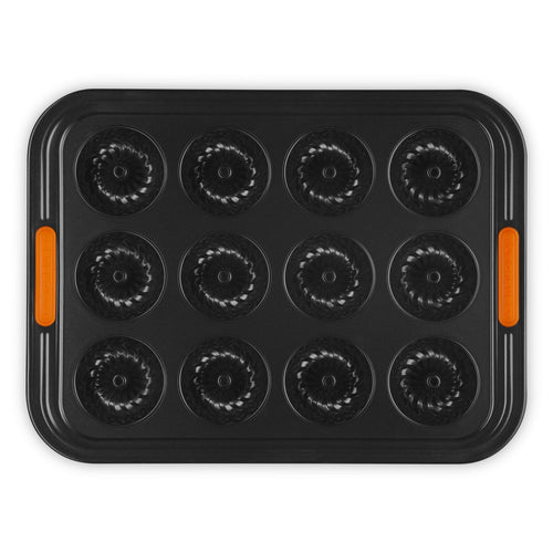12 Formen - Le Creuset Forme Speciali Antihaft-Mini-Donut-Form aus Kohlenstoffstahl