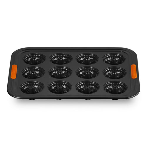 12 Formen - Le Creuset Forme Speciali Antihaft-Mini-Donut-Form aus Kohlenstoffstahl
