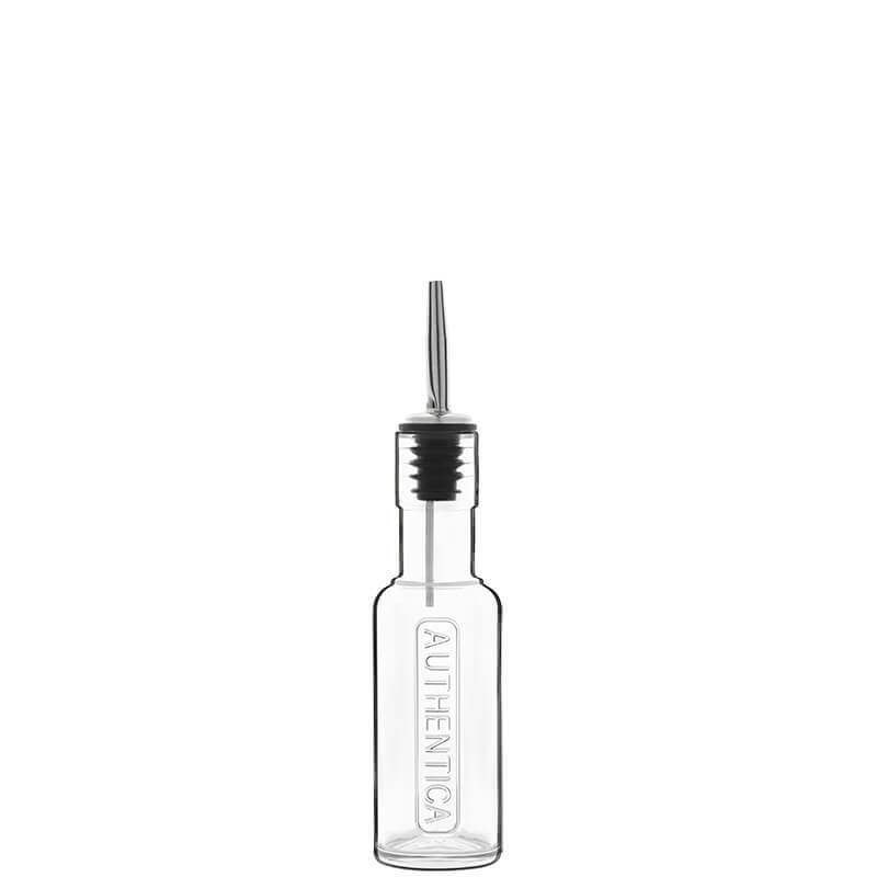 Bouteille transparente en verre avec verseur en acier et bouchon noir, étiquette en relief avec inscription AUTHENTICA