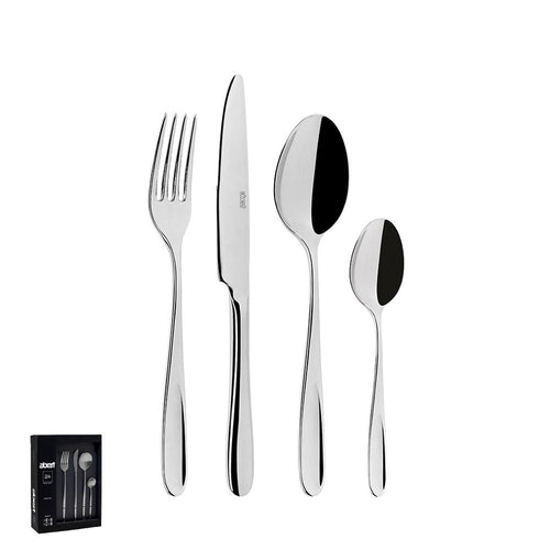 Set di posate in acciaio inox lucido, comprendente un coltello, una forchetta e due cucchiai, con confezione nera visibile a sinistra.