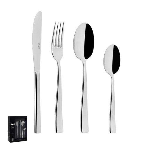 Set di posate in acciaio inox lucido, composto da coltello, forchetta, cucchiaio grande e cucchiaino, con confezione nera visibile.