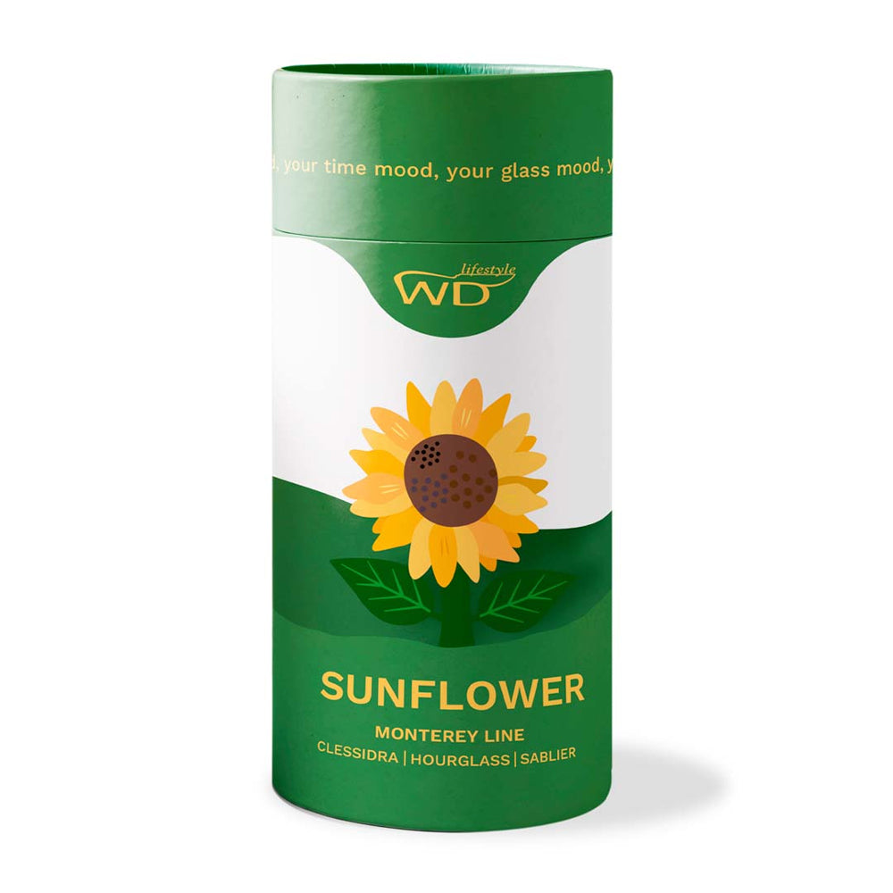 Emballage cylindrique vert et blanc avec illustration de tournesol jaune et marron, logo WD lifestyle et inscriptions jaunes.