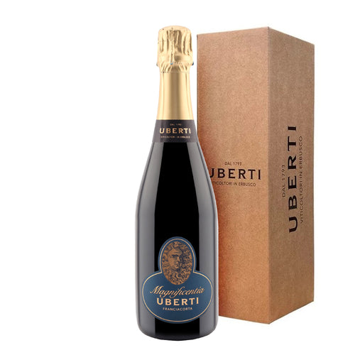 Bottiglia di champagne scuro con tappo dorato e etichetta blu, accanto a scatola marrone con scritte nere "Uberti" e "Dal 1793