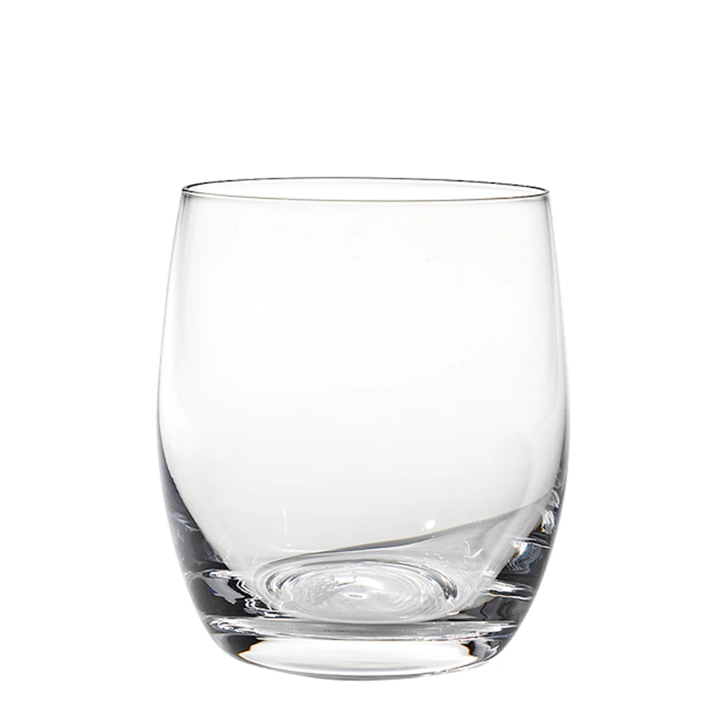 Vaso transparente de cristal con base gruesa y cuerpo ligeramente redondeado sobre fondo blanco.