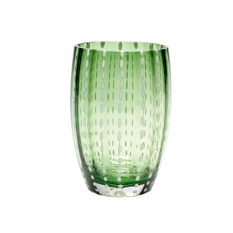 Transparent green glass tumbler with white oval decorations aligned vertically, white background.
