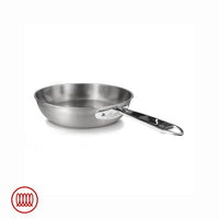 Brushed round stainless steel frying pan with shiny perforated handle, thick bottom, on white background.