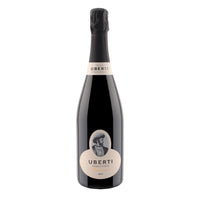 Bottiglia di vino spumante con etichetta nera e bianca, logo "UBERTI", tappo a spirale, ambientazione neutra.