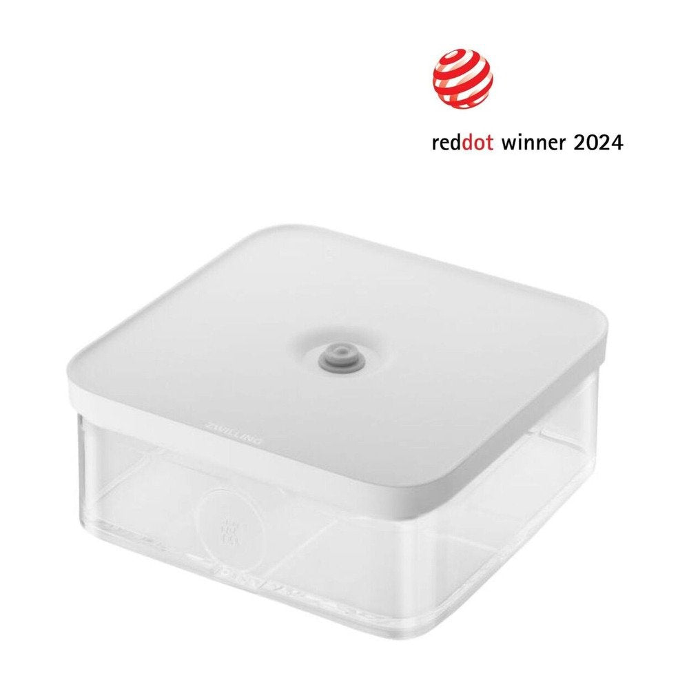 Contenedor cuadrado transparente con tapa blanca, con dispositivo central. Logo "red dot winner 2024" arriba a la derecha.