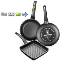 Set di padelle in alluminio nero, una rotonda e una quadrata, con manici neri e dettagli arancioni.