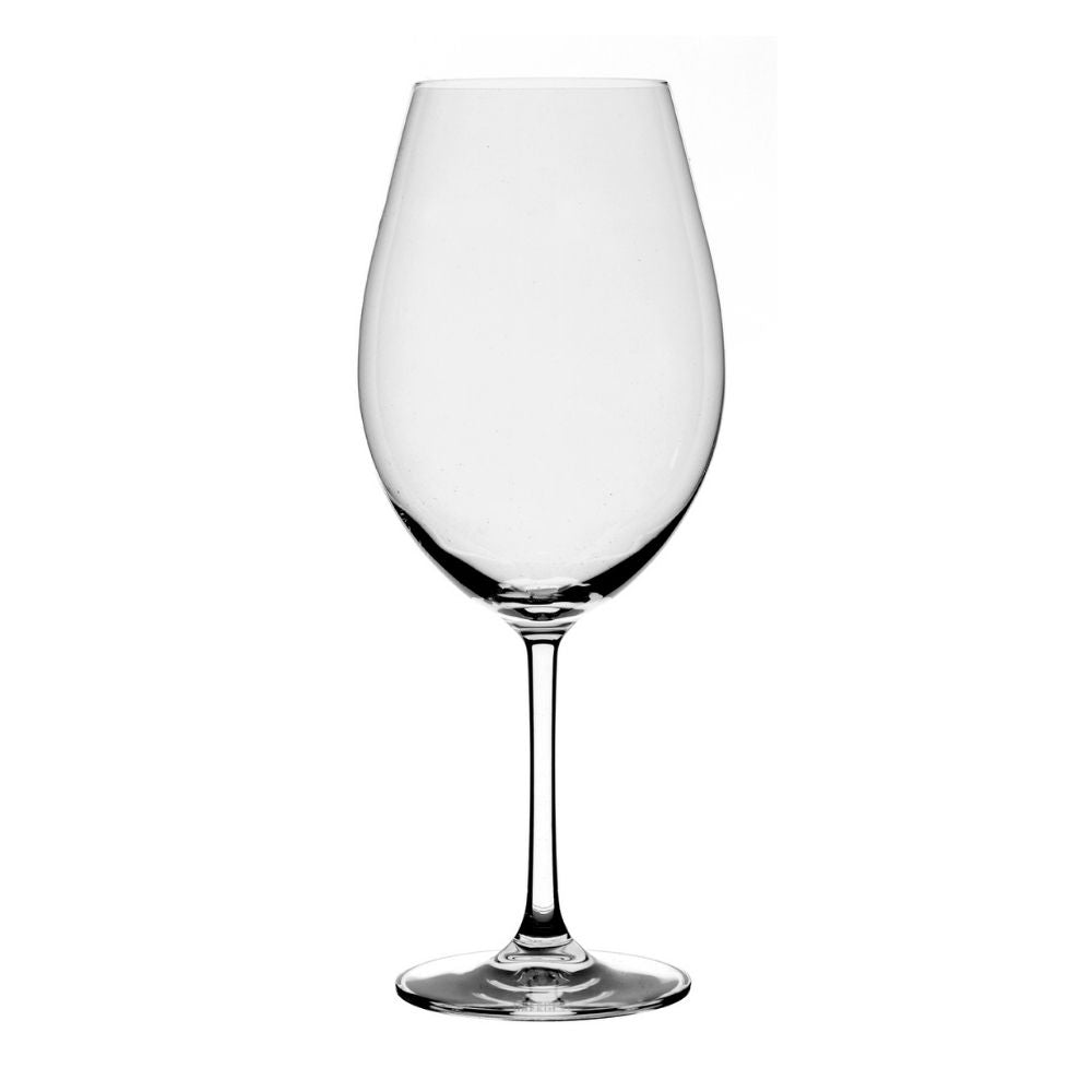 transparent wine glass in glass with long stem and wide bowl on white background