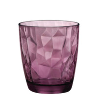 Small satin-finish purple glass tumbler with faceted surface on white background