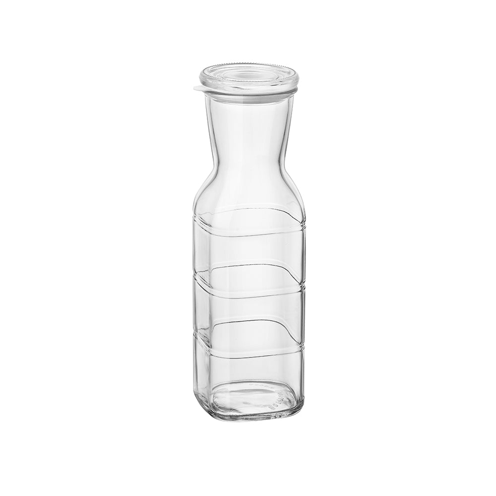 Caraffa in vetro trasparente con decorazione a spirale.