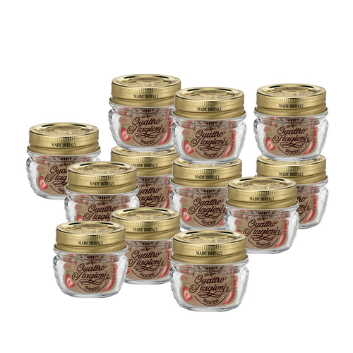 Barattoli di vetro trasparente con coperchio dorato, etichetta con scritta Quattro Stagioni Rocco e immagine di pomodoro, su sfondo bianco.