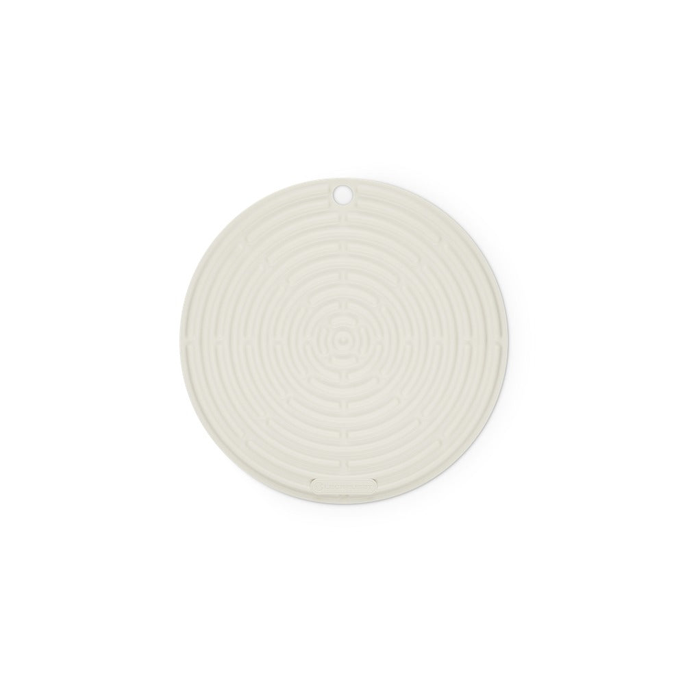 Disque circulaire en silicone transparent avec motif de labyrinthe, vertical, sans bords définis.