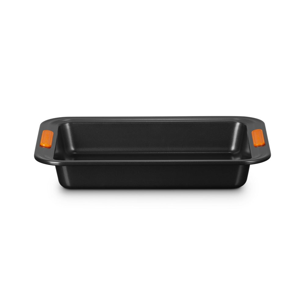 Black rectangular baking tray with orange handles, made of non-stick material, on white background.