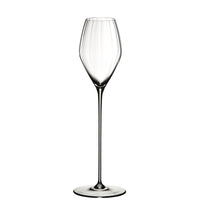 transparent glass tumbler with long stem and sottile and slightly tapered bowl on white background