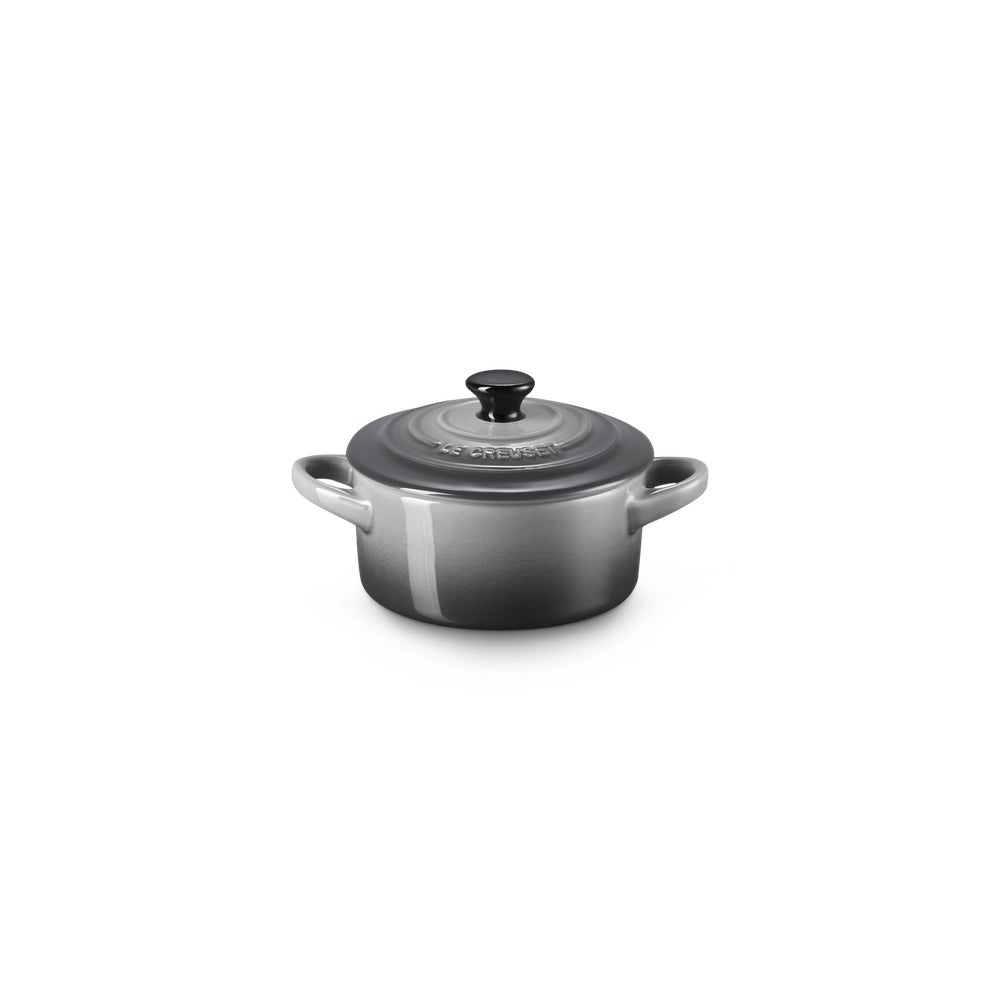 Grey enamelled cast iron saucepan with lid and handles, glossy surface and uniform finish.