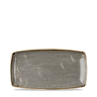 Bandeja rectangular de cerámica gris con bordes dorados y superficie lisa, decorada con pequeñas manchas oscuras.