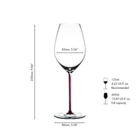 Copa de vino de vidrio transparente con pie rojo, elegante, 250 mm de alto y 85 mm de diámetro. Base redonda.
