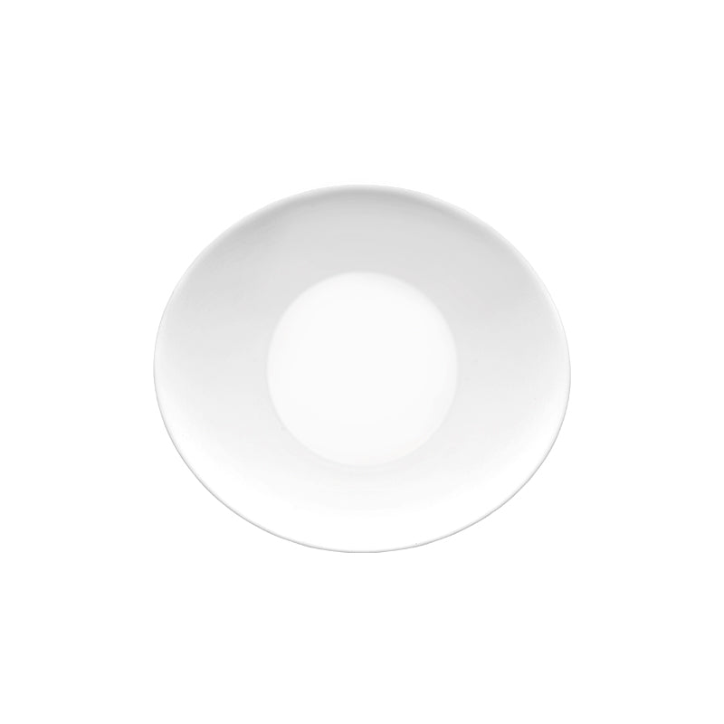 White round plate with wide rim and recessed center, smooth glossy surface, white background