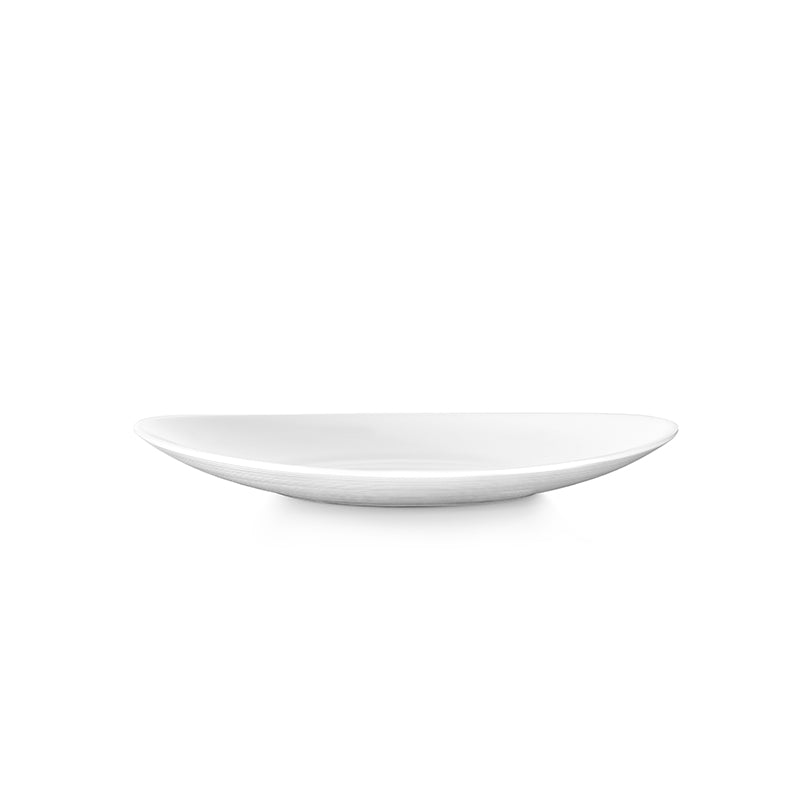 White oval ceramic plate with thin rim on white background
