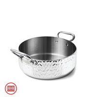 Casserole ronde en acier inox avec surface esterna martelée, deux anses tubolari, interno liscio et finition brillante.