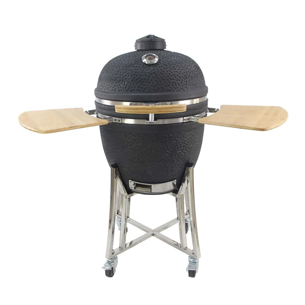 Black egg-shaped barbecue with textured surface, mounted on a metal stand with wooden shelves.