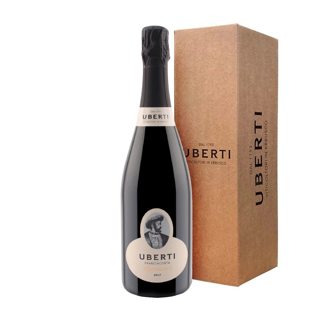 bottiglia di vino spumante nero con etichetta beige e ritratto uomo antico, accanto scatola marrone con scritta Uberti Franciacorta Brut