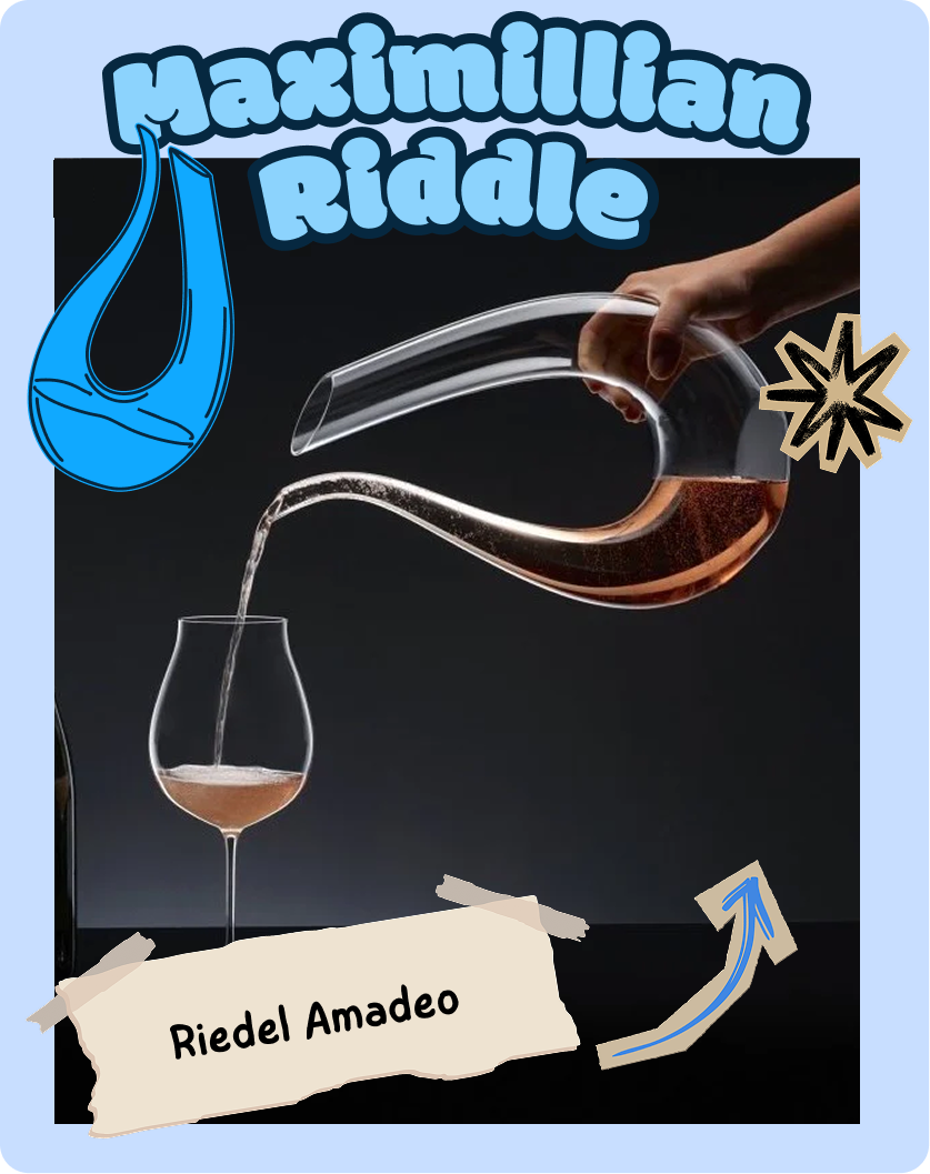 Maximilian Riddle con bicchiere di vino.