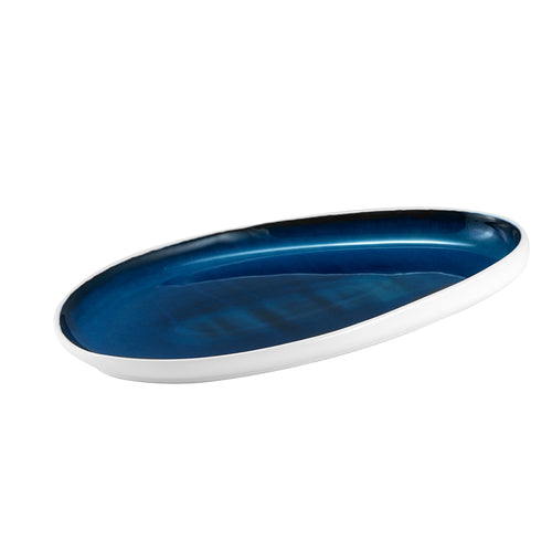 Oval ceramic plate with smooth blue interior and glossy white outer rim, white background