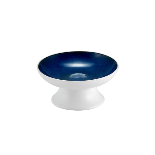 Ciotola rotonda in ceramica bianca con interno smaltato blu lucido, base corta e ampia, su sfondo bianco.