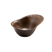 Brown bowl with black speckled interior, elongated irregular shape, glossy ceramic material, on white background