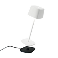 White table lamp with detached black base on white background, modern design and essential lines.