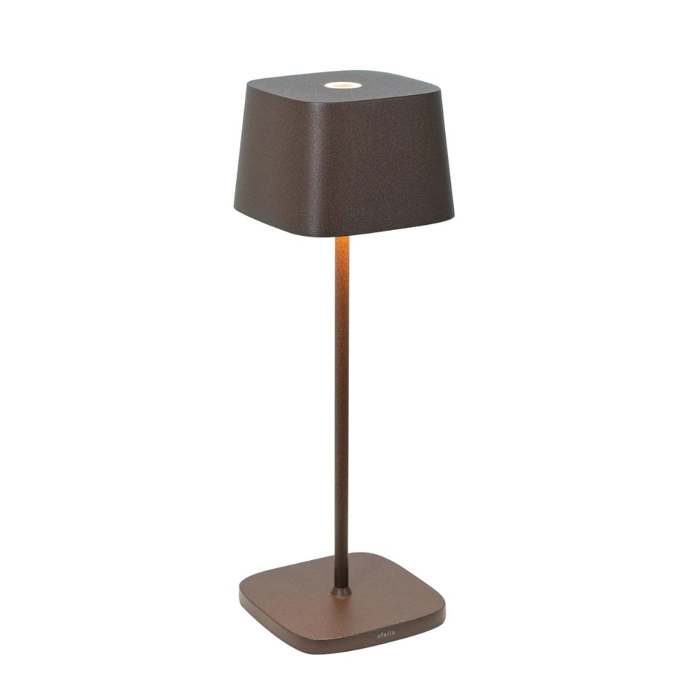 Dark brown metal table lamp with square base and square shade with rounded corners on white background