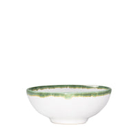 Ciotola in ceramica bianca con bordo verde e dorato, con forma rotonda e fondo leggermente rialzato.