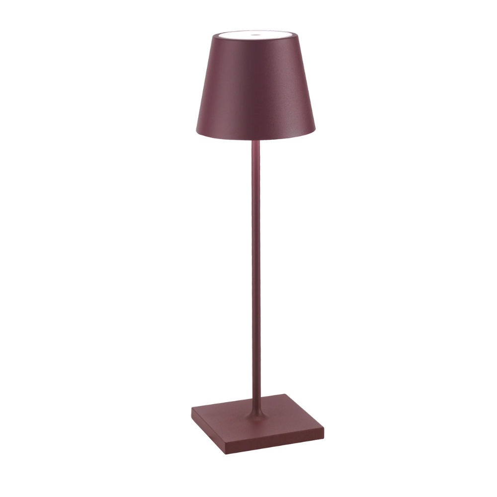 Table lamp with burgundy conical shade, square metal structure and base in matching color, white background