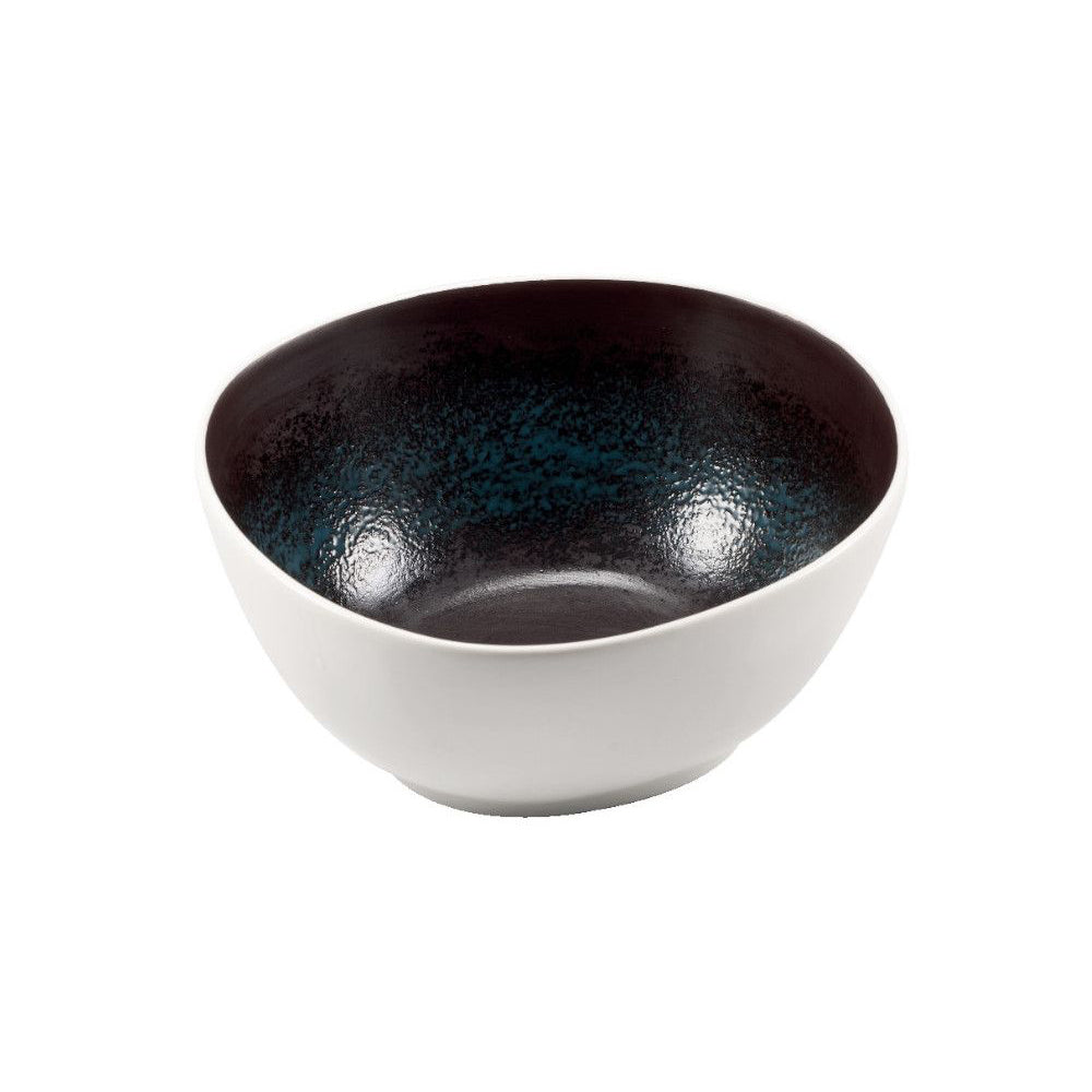 Bol en céramique avec extérieur blanc et intérieur noir à texture brillante et pointillé bleu, forme ronde à bord irrégulier