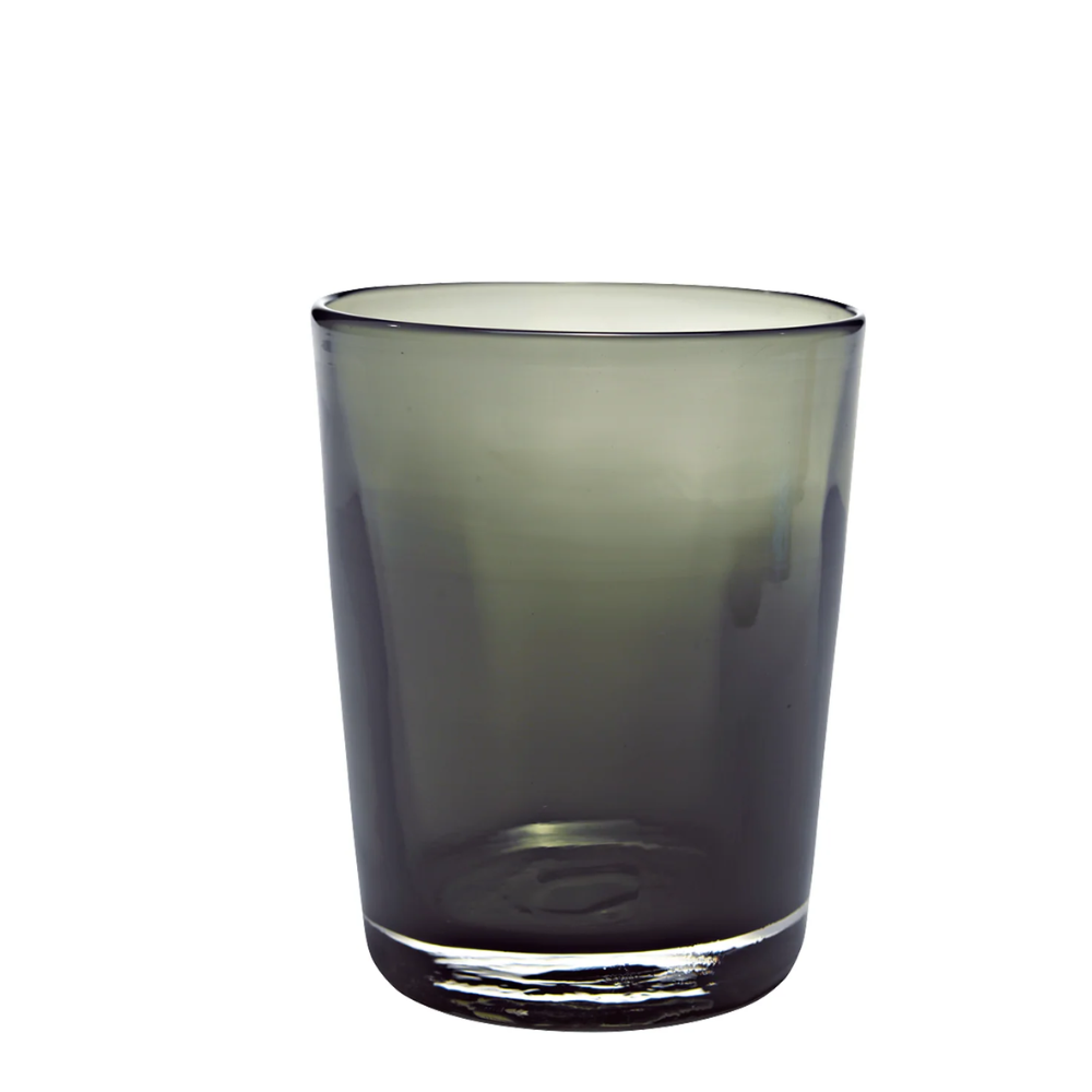 Transparent smoke grey glass tumbler with cylindrical shape, neutral white background.