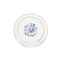 piatto rotondo trasparente con cerchio centrale decorativo bianco a pois blu e grigi su sfondo bianco, vetro o ceramica