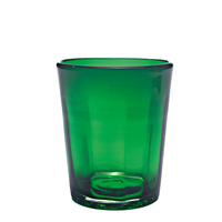 Transparent green glass tumbler with slightly conical shape and rounded rim on white background